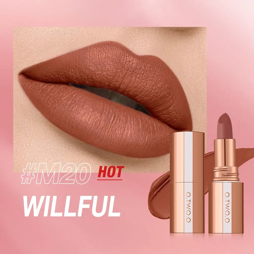 Lipstick with 'WILLFUL' branding on a pink background