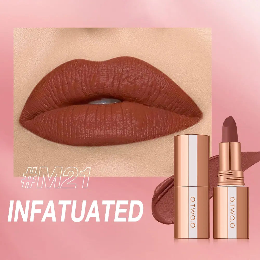 Lipstick with '#M21 Infatuated' shade on a pink background